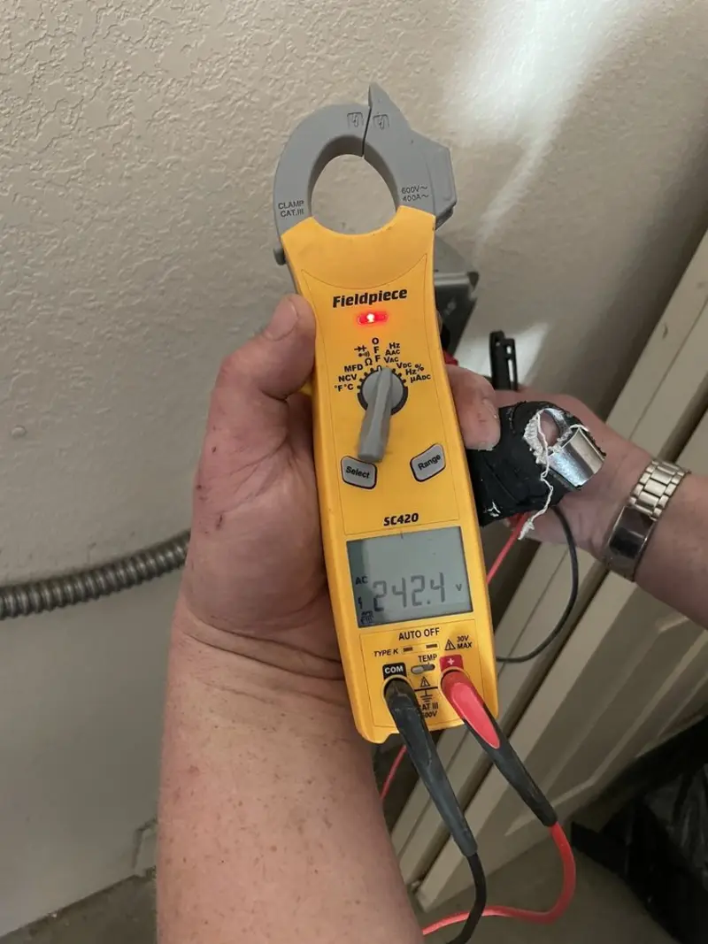 Voltage testing with clamp meter during Generator Installation in Newport News